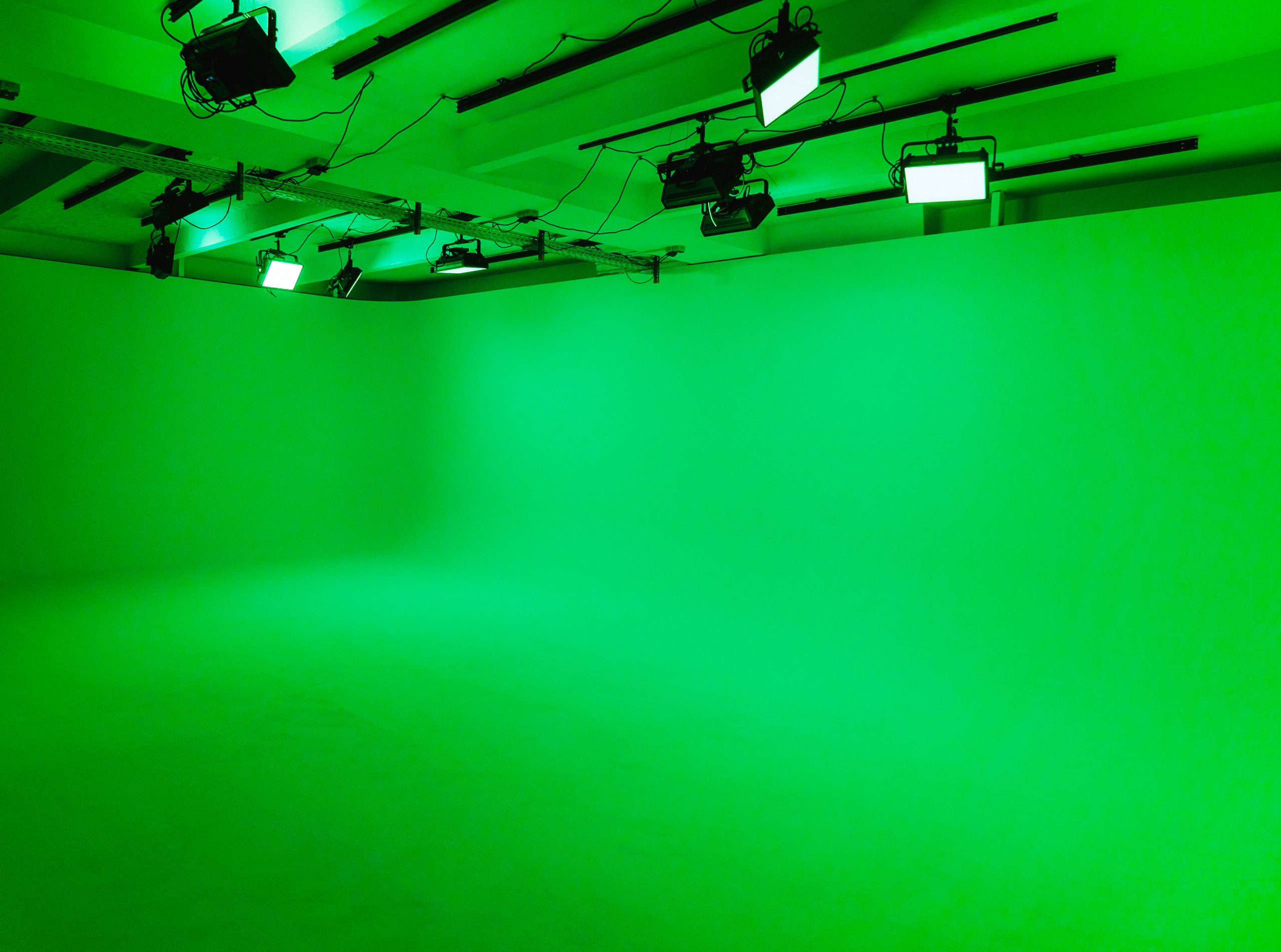 The huge cyclorama has been completely illuminated in green
